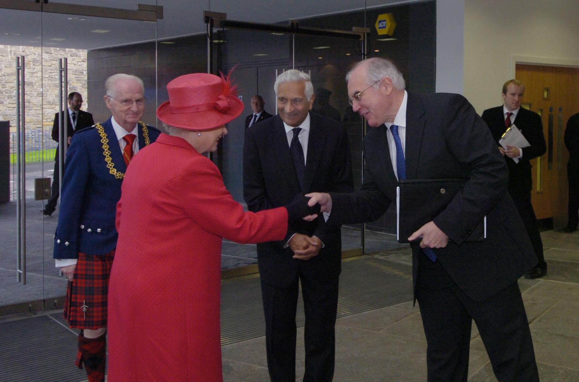the Queen meeting the Chancellor and the Principal