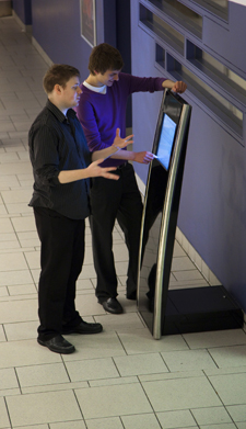 Students using new Library and Learning Centre touchscreen kiosk