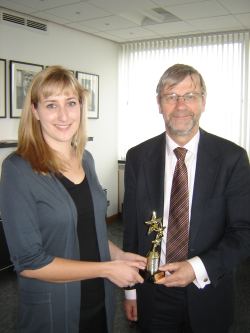  pic show Julia receiving her award from Professor Pete Downes, Principal of the University