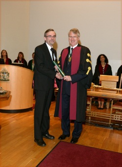 Image shows Professor Steele receiving his Fellowship from Dr Neil Dewhurst, president of the Royal College of Physicians
 of Edinburgh.
