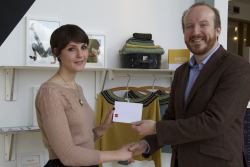 Picture shows Katy Birchall receiving her prize from Design in Action Deputy Director Michael Marra
