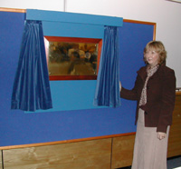 a photo of Ian's wife Jackie unveiling the plaque