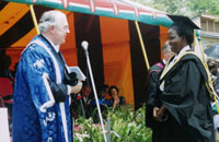 photo of Sir Alan with Kenyan graduate