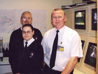 a photo of control room staff
