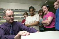 photo of Michael Bolik with students