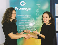 a photo of Kirsteen Campbell, right, collecting her award.