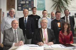 photograph shows Robert Burns the Lord Dean of Guild with Guildry members and student