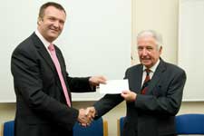 pic shows (left-to-right) Professor William Saunders, Dean of the School of Dentistry, receiving the cheque from Professor Sir David Mason